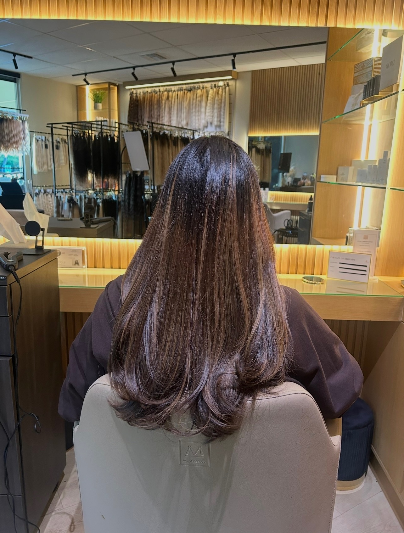 Long brunette extension result from behind